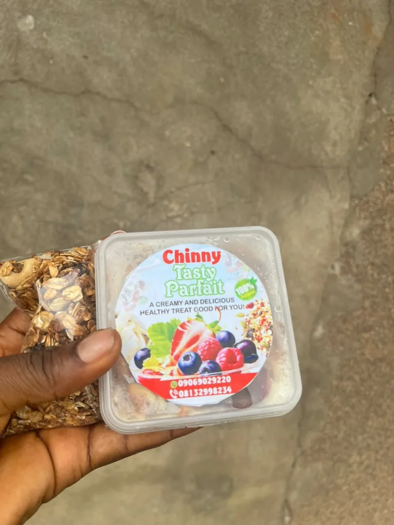 Packaged Chinny Tasty Parfait cup held in hand